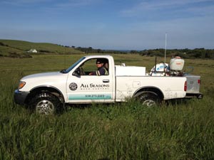 All Seasons Weed Control - truck in the field