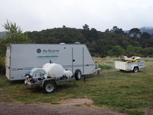 All Seasons Weed Control euqipment trailer and weed control quipment on the job site